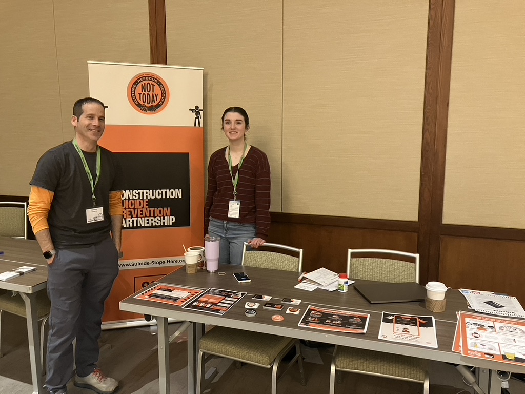 Max and Anna tabling at the 2023 Construction Working Minds Conference in Kansas City, MO