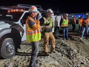 Max giving a pre-dawn toolbox talk